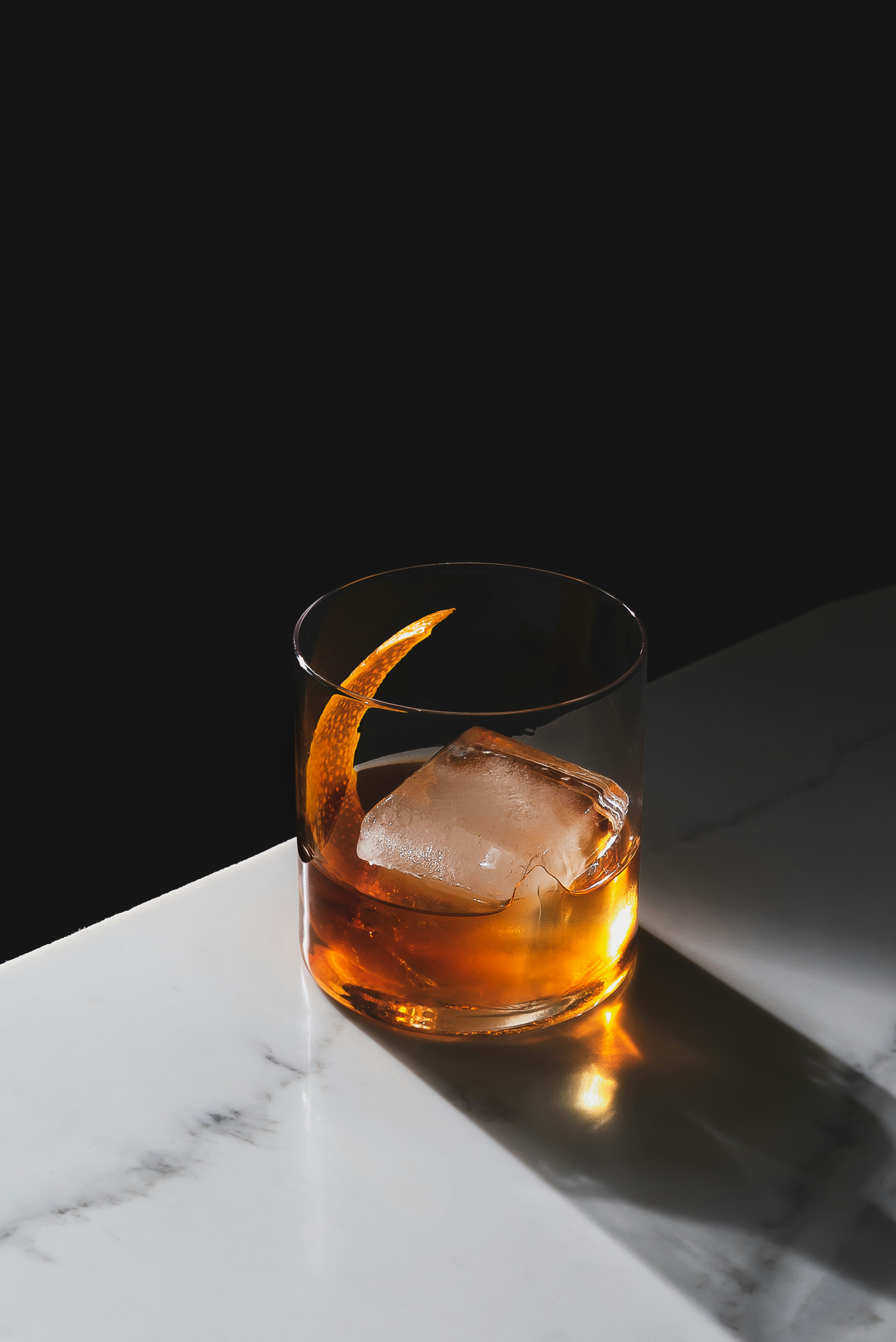Bourbon with orange peel garnish